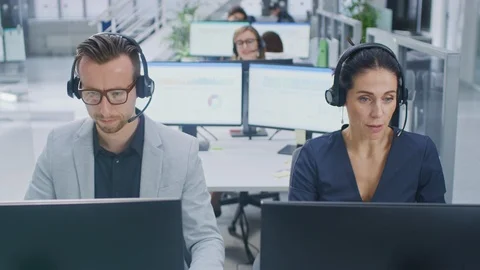 In Modern Open Space Office: Team of Customer Support People and Salesmen Workin Video stock 106769636