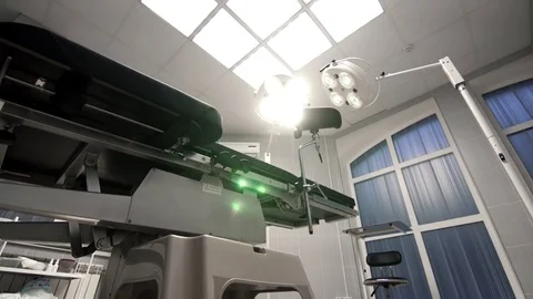 Modern operating table changes the slope in a modern hospital Stock Footage 83762053