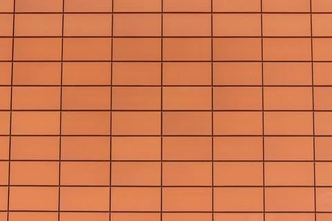 Modern orange tiled wall grid Foto stock