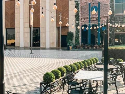 Modern Outdoor Cafe with String Lights in U-Walk Riyadh Stock Photos