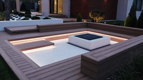 Modern Outdoor Fire Pit Complete with Elegant Landscaping Enhances Your Backyard Stock Footage 314277264