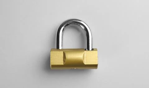 Modern padlock on light background, top view 스톡 사진