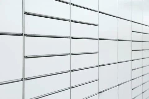 Modern parcel locker with many postal boxes as background 写真素材