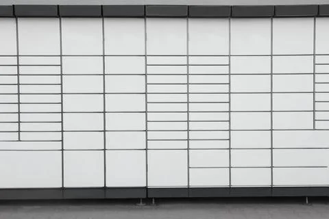 Modern parcel locker with many postal boxes Foto stock
