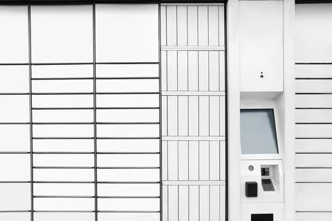Modern parcel locker with many postal boxes as background Foto stock