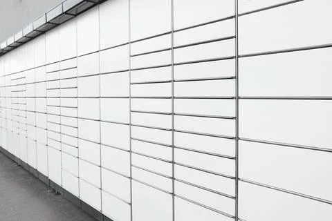 Modern parcel locker with many postal boxes Stock Photos