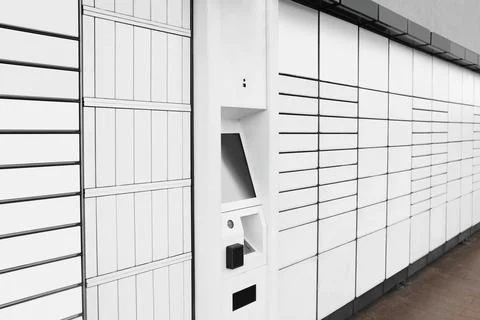 Modern parcel locker with many postal boxes 스톡 사진