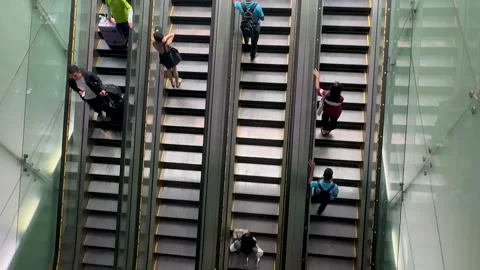 Modern passenger escalator going up Stock Footage 318655658