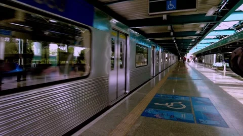 Modern passenger train leaves the platform of Santos-Imigrantes subway station, Stock-Footage 342623708
