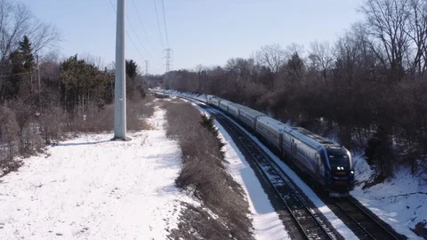 Modern Passenger Train Passes by Fast 4k, Overhead Aerial Drone Shot Stock Footage 125016257