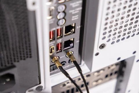 Modern pc io panel featuring wifi 7 antennas, 5g ethernet, usb-c 100w Stockfoto's