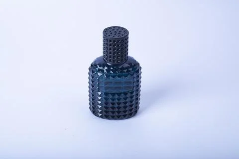 Modern perfume bottle on white Stock Photos