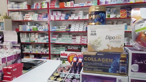 Modern Pharmacy interior. Supplements on the shelves of an organic health and Stock Footage 202246632