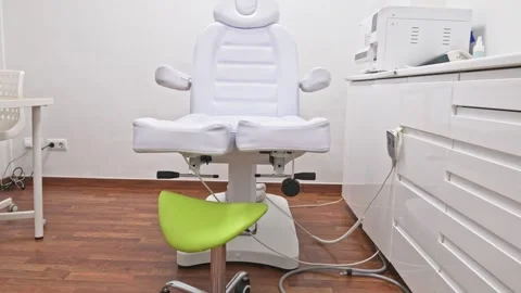 Modern physiotherapy clinic room with adjustable hydraulic chair Stock Footage 296839645