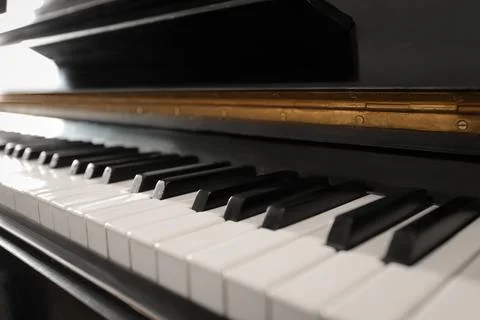 Modern piano with black and white keys, closeup Stock Photos