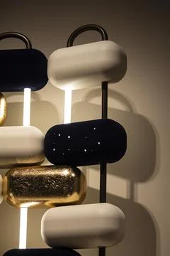 Modern pill-shaped modular wall lamp Stock Photos