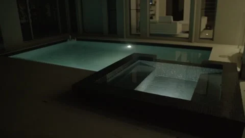 Modern Pool and Spa Lit at Night at Residence in Sunshine Coast Australia Stock Footage 341314282