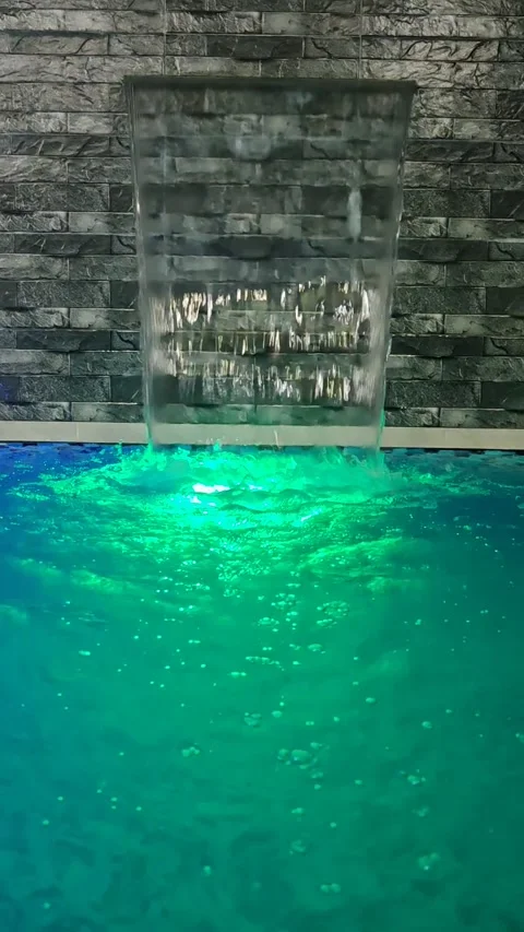 Modern Pool Waterfall Feature Design Video stock 336705099