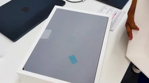 Modern Portable macbook With Gray Protective Surface unboxing 스톡 동영상 343878846
