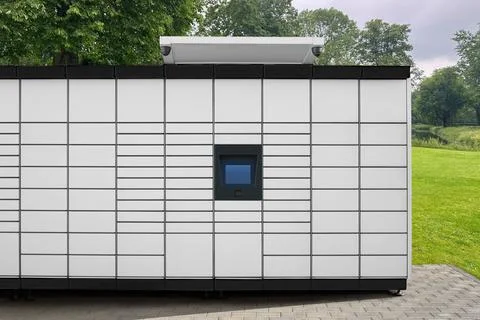 Modern postal machine for parcels and letters outdoors Stock Photos