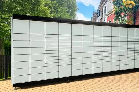 Modern postal machine for parcels and letters outdoors Stock Photos