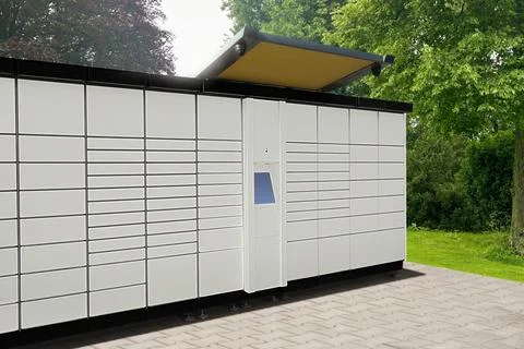 Modern postal machine for parcels and letters outdoors Stock Photos