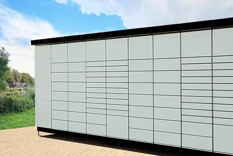 Modern postal machine for parcels and letters outdoors Stock Photos