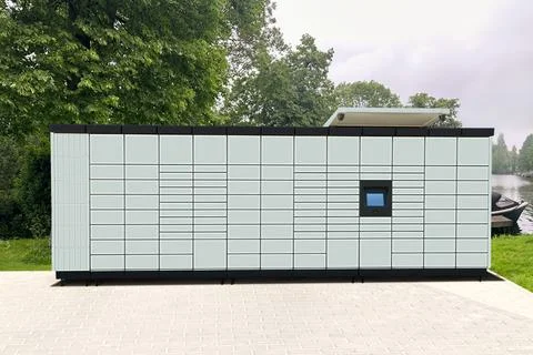 Modern postal machine for parcels and letters outdoors Stock Photos