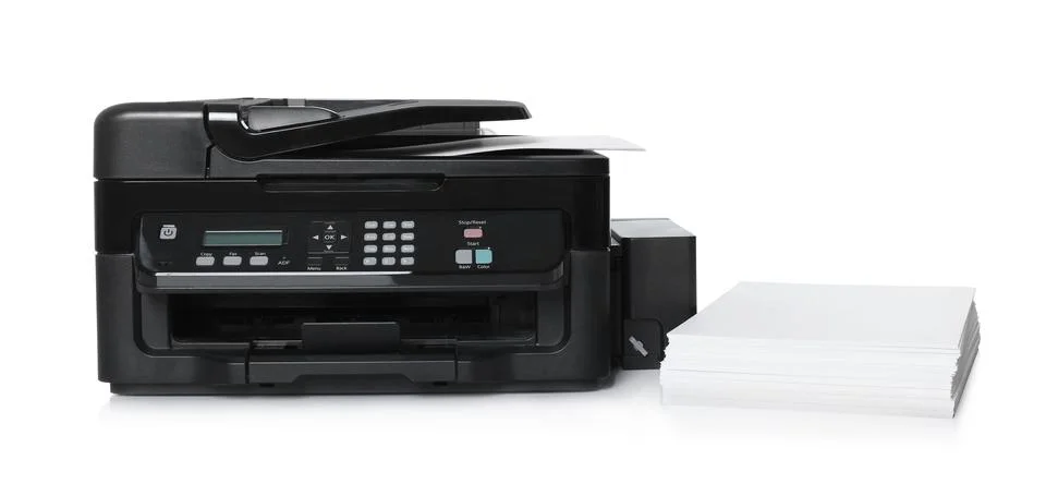 Modern printer and stack of paper on white background Foto stock