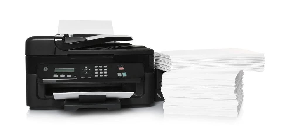 Modern printer and stack of paper on white background 写真素材