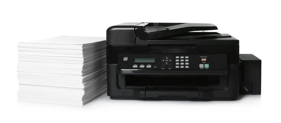 Modern printer and stack of paper on white background Foto stock