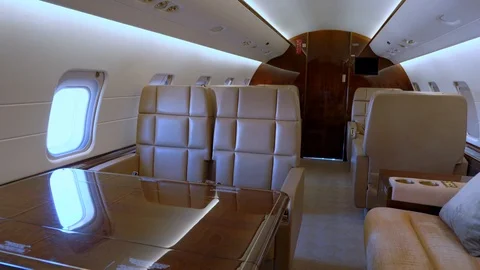 Modern private business jet leather seats and interior Stock Footage