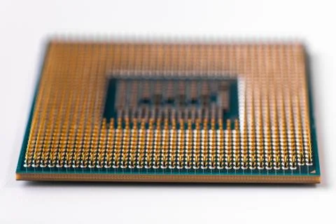Modern processor for a computer or laptop close-up on a white background. Mac Stock Photos