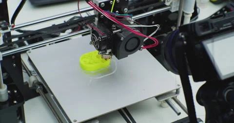 Modern production. 3D printer prints a complex plastic part.close-up of a Stock Footage 163180793