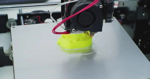 Modern production. 3D printer prints a complex plastic part.close-up of a Stock Footage 163246928