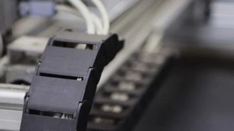 A modern production machine for applying inscriptions and photographs on a Video stock 253469672