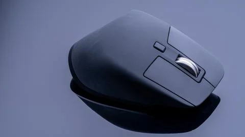 Modern professional computer mouse for designers on a black background with.. Stock Photos