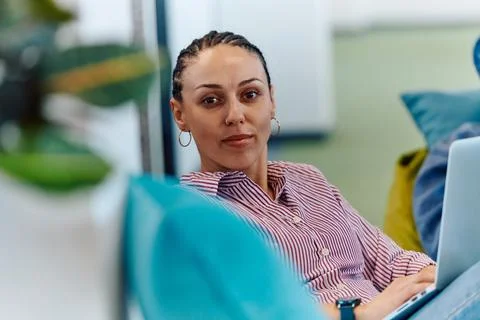 A modern programmer discussing future business projects with colleagues in a Stock Photos