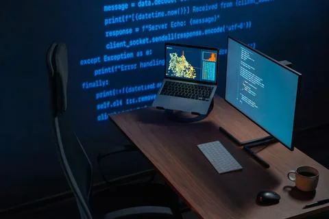 Modern Programming Workstation With Multiple Screens Stock Photos