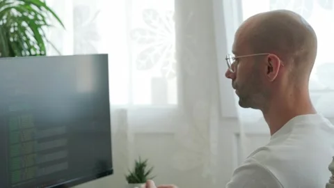 Modern programming, young man programming on computer, programmer's compute.. Stock Footage 287606869