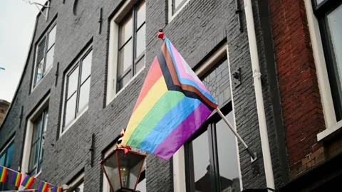 Modern, progress LGBTQ pride flag during pride month, including black stripe for Stock Footage 196652196