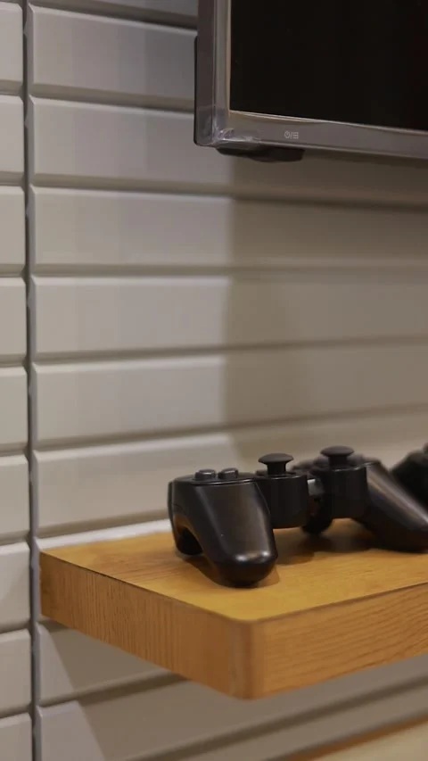 Modern ps5 controller in wooden table. Stock Footage 291528789