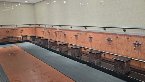 Modern public wudu facility for ritual ablution in a mosque. Clean interior Stock Footage 329301106
