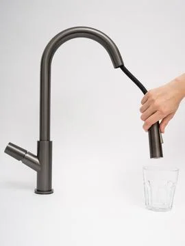 Modern pull-down kitchen faucet on white background Foto stock
