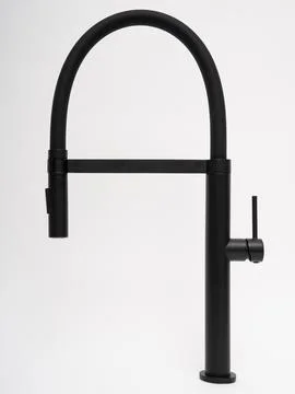 Modern pull-down kitchen faucet on white background Fotos Stock
