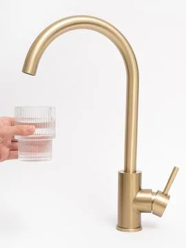 Modern pull-down kitchen faucet on white background Stock Photos
