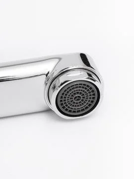 Modern pull-down kitchen faucet on white background 写真素材