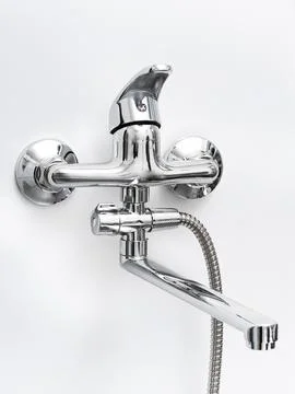 Modern pull-down kitchen faucet on white background Stock Photos