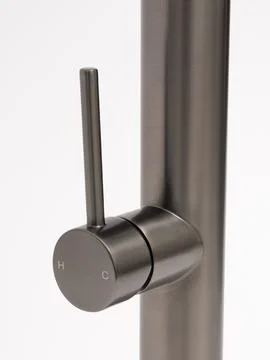 Modern pull-down kitchen faucet on white background 写真素材