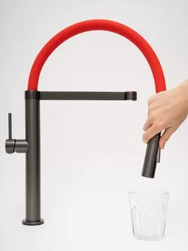 Modern pull-down kitchen faucet on white background Stock Photos